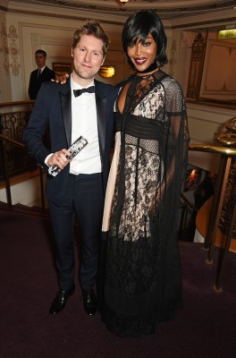 LONDON, ENGLAND - NOVEMBER 23: Christopher Bailey, winner of the Creative Campaign award for Burberry, and presenter Naomi Campbell attend the British Fashion Awards in partnership with Swarovski at the London Coliseum on November 23, 2015 in London, England. (Photo by David M. Benett/Dave Benett/Getty Images)